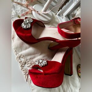 Platform red velvet heels
